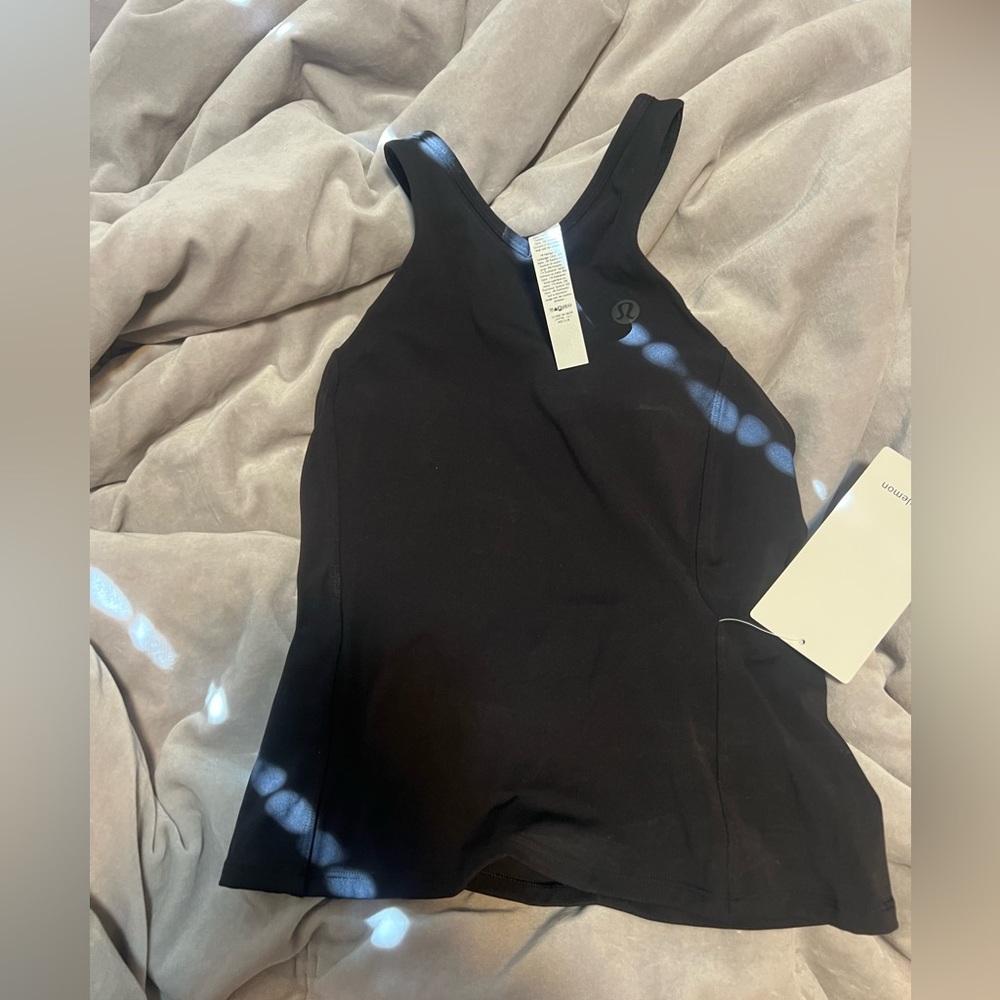 NWT LULULEMON WAIST LENGTH V NECK TENNIS TANK
Size 6, black - Picture 2 of 4